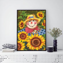 Foto laden in Gallery viewer, Vogelverschrikker tussen zonnebloemen v.a. 50x70cm