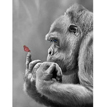 Foto laden in Gallery viewer, Aap met vlinder